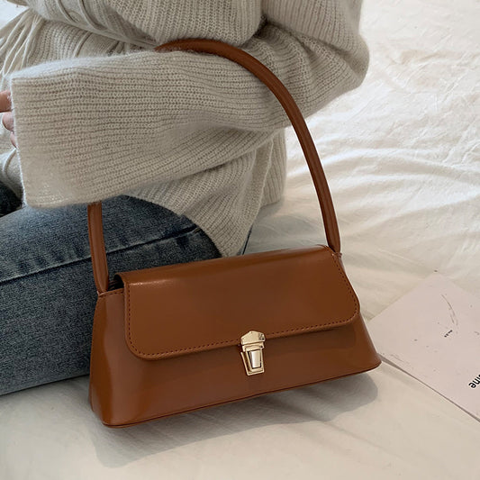 Textured French Style Women's New Fashion Retro2025Large Capacity Casual Solid Color Lock Buckle Handheld Baguette Underarm Bag for Women