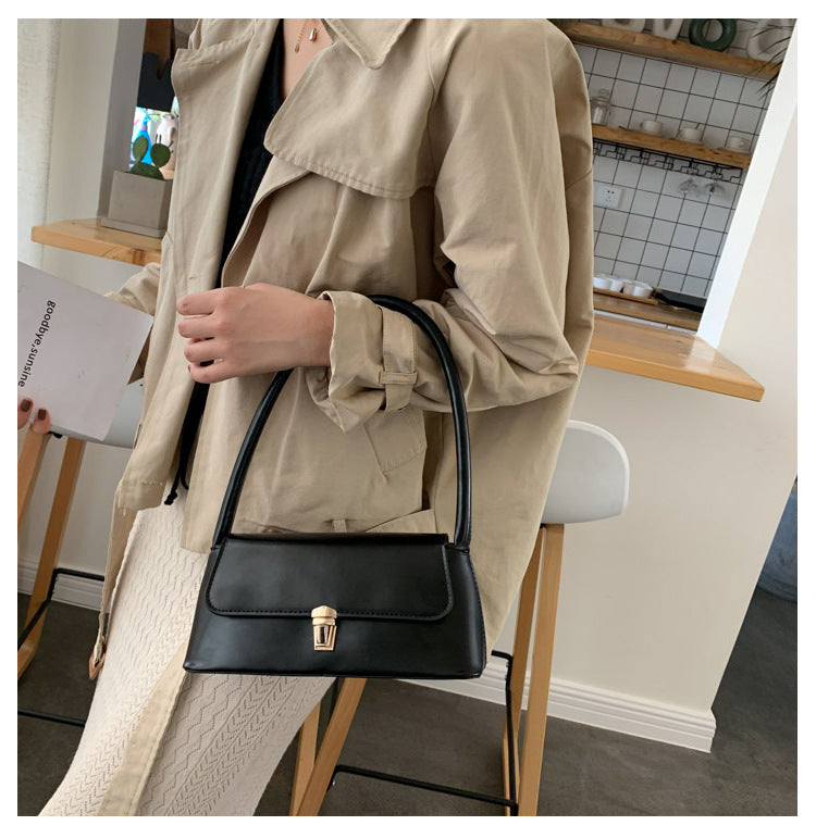 Textured French Style Women's New Fashion Retro2025Large Capacity Casual Solid Color Lock Buckle Handheld Baguette Underarm Bag for Women