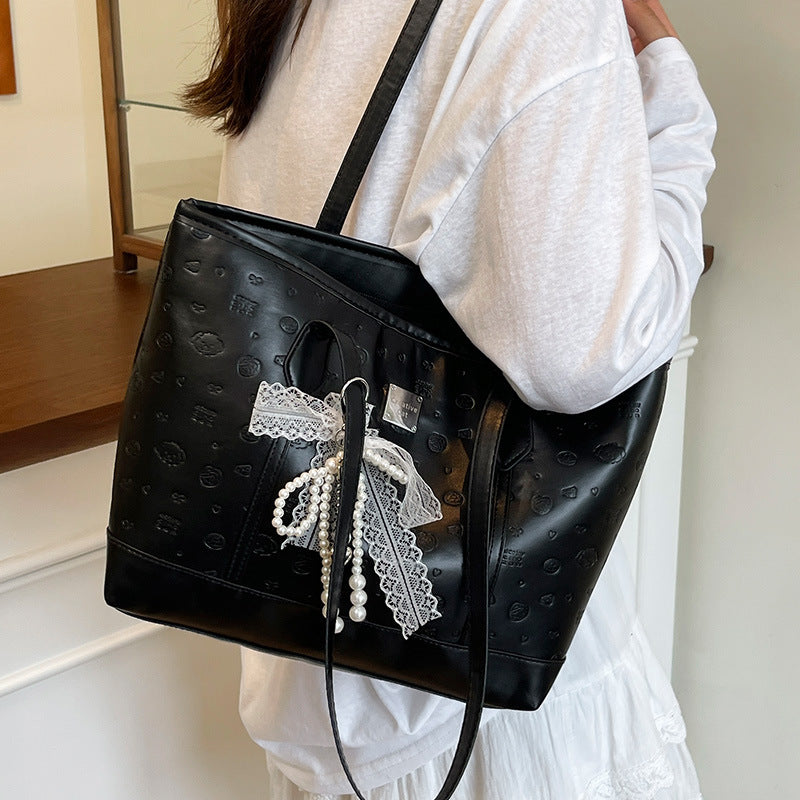 European and American Trendy Simple Large Capacity Tote Bag2025New high-value casual cute embossed single-shoulder handbag