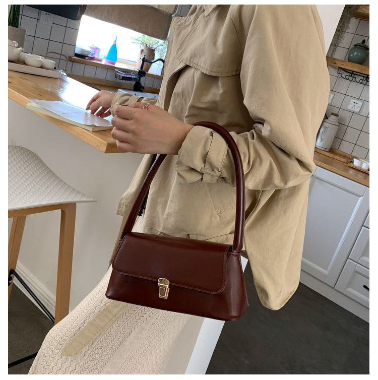 Textured French Style Women's New Fashion Retro2025Large Capacity Casual Solid Color Lock Buckle Handheld Baguette Underarm Bag for Women