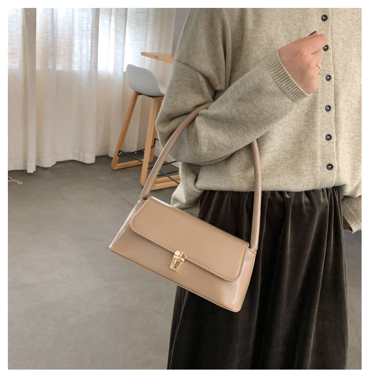 Textured French Style Women's New Fashion Retro2025Large Capacity Casual Solid Color Lock Buckle Handheld Baguette Underarm Bag for Women