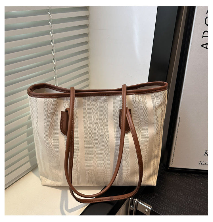 Casual Patchwork Fashion Large Capacity Pendant2025Spring New Fashion Commuting Texture Casual Shoulder Tote Bag for Women