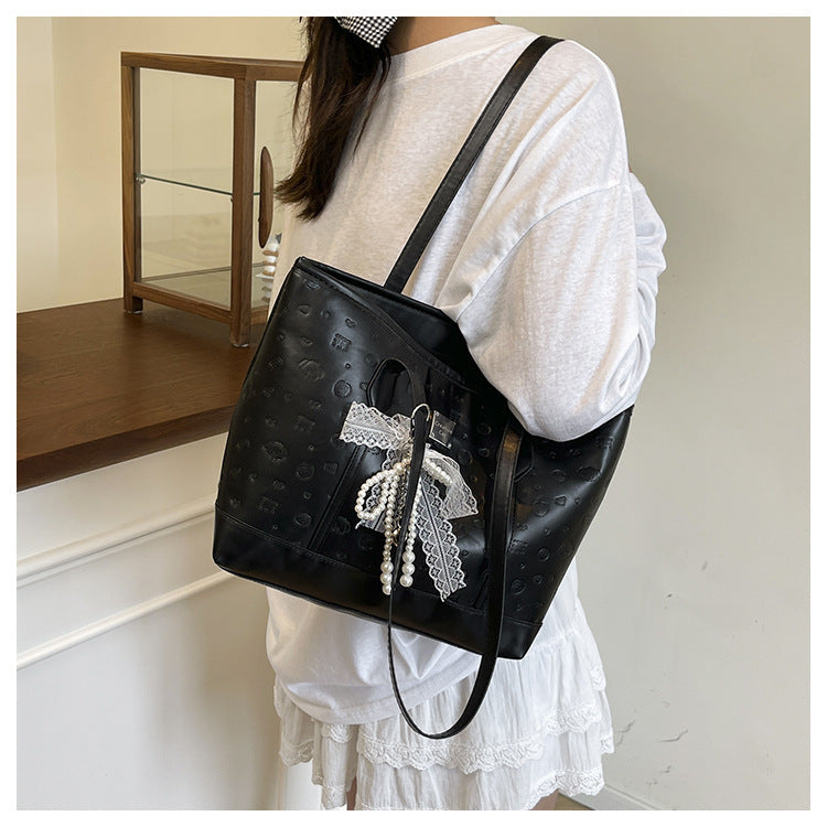 European and American Trendy Simple Large Capacity Tote Bag2025New high-value casual cute embossed single-shoulder handbag