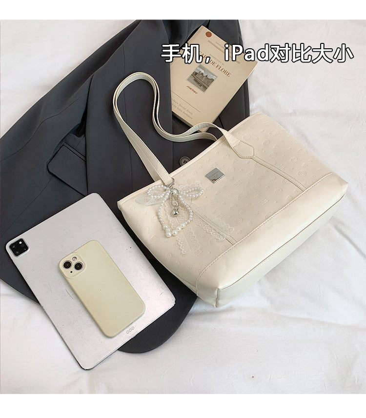 European and American Trendy Simple Large Capacity Tote Bag2025New high-value casual cute embossed single-shoulder handbag