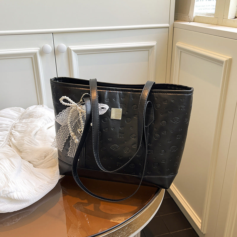 European and American Trendy Simple Large Capacity Tote Bag2025New high-value casual cute embossed single-shoulder handbag