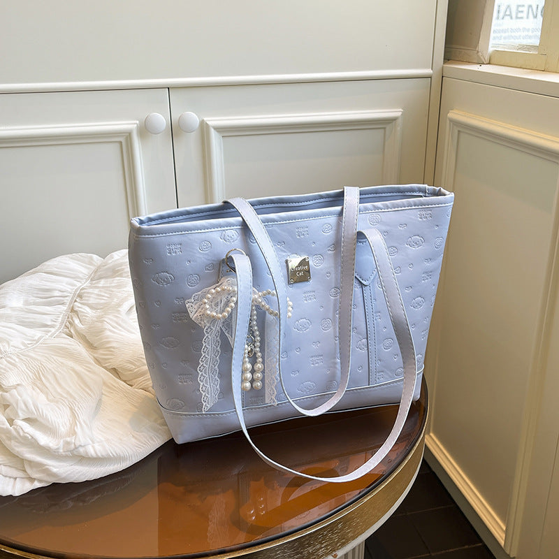 European and American Trendy Simple Large Capacity Tote Bag2025New high-value casual cute embossed single-shoulder handbag
