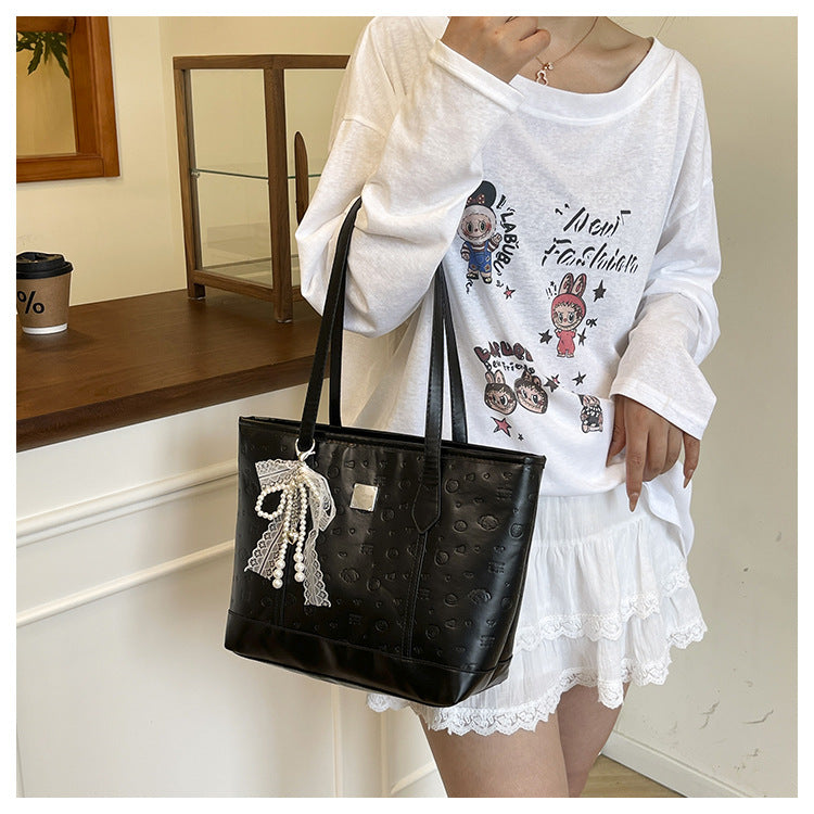 European and American Trendy Simple Large Capacity Tote Bag2025New high-value casual cute embossed single-shoulder handbag