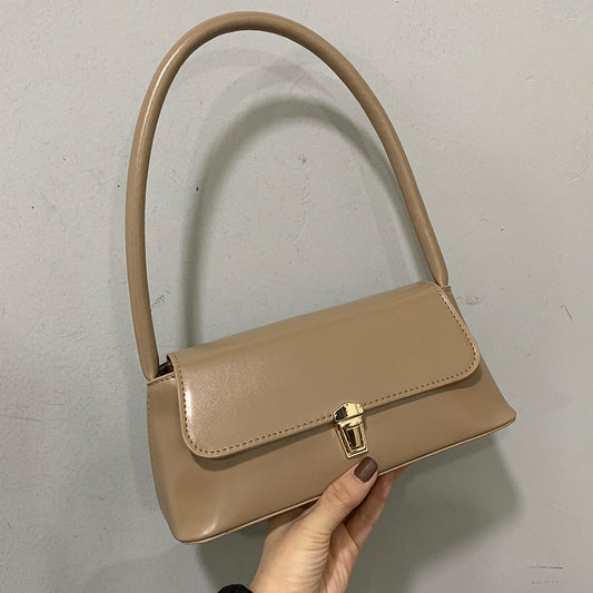 Textured French Style Women's New Fashion Retro2025Large Capacity Casual Solid Color Lock Buckle Handheld Baguette Underarm Bag for Women
