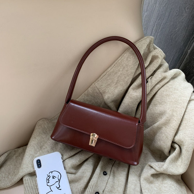 Textured French Style Women's New Fashion Retro2025Large Capacity Casual Solid Color Lock Buckle Handheld Baguette Underarm Bag for Women