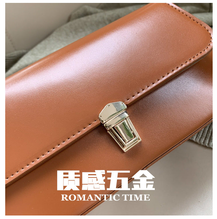 Textured French Style Women's New Fashion Retro2025Large Capacity Casual Solid Color Lock Buckle Handheld Baguette Underarm Bag for Women