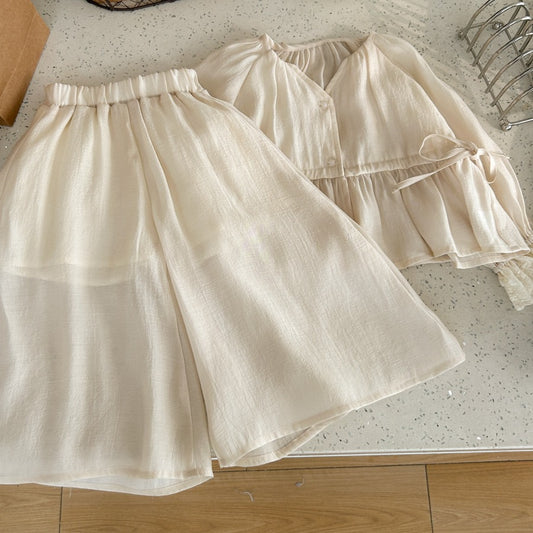 High-end socialite temperament girls' summer outfit2024High-end Sun Protection Shirt and Tea Break Skirt Hot-selling Two-piece Set