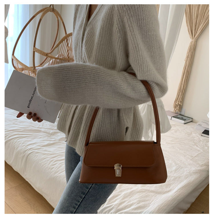 Textured French Style Women's New Fashion Retro2025Large Capacity Casual Solid Color Lock Buckle Handheld Baguette Underarm Bag for Women