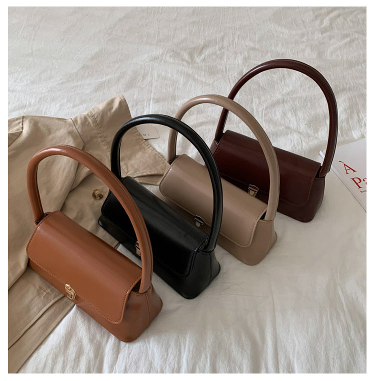 Textured French Style Women's New Fashion Retro2025Large Capacity Casual Solid Color Lock Buckle Handheld Baguette Underarm Bag for Women