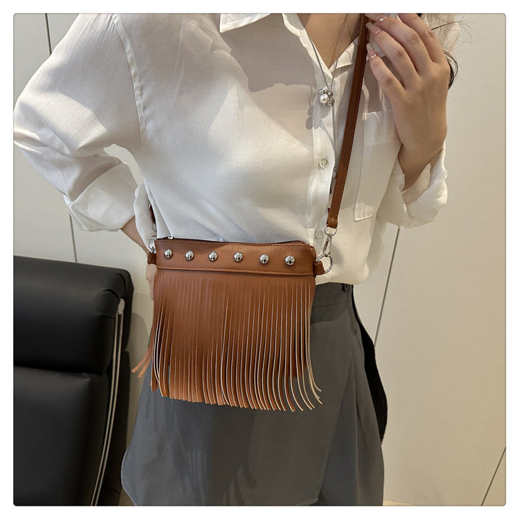 French retro tassel commuter bucket bag for women2025Summer new cross-border style soft shoulder crossbody tassel bag