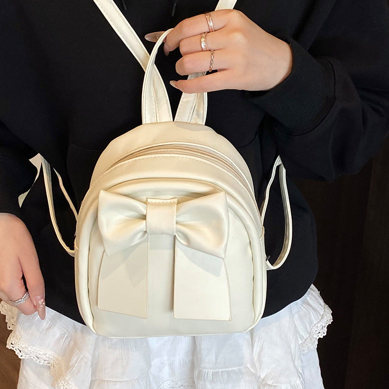 2025Summer New Niche Bow Backpack for Women, Stylish and Simple Handheld, Single Shoulder, Crossbody, and Double Shoulder Backpack