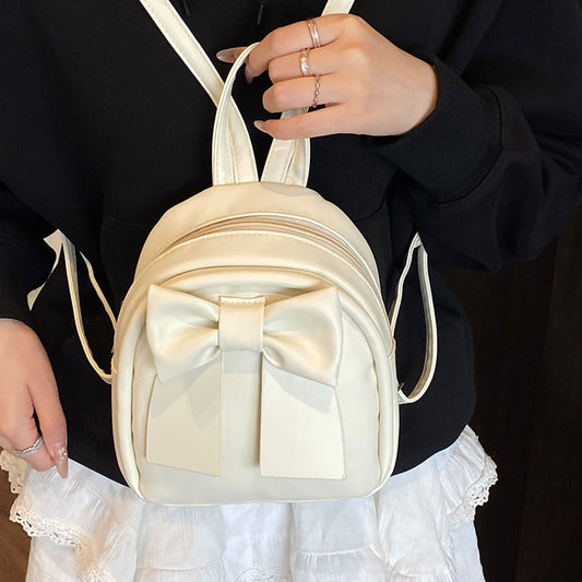 2025Summer New Niche Bow Backpack for Women, Stylish and Simple Handheld, Single Shoulder, Crossbody, and Double Shoulder Backpack