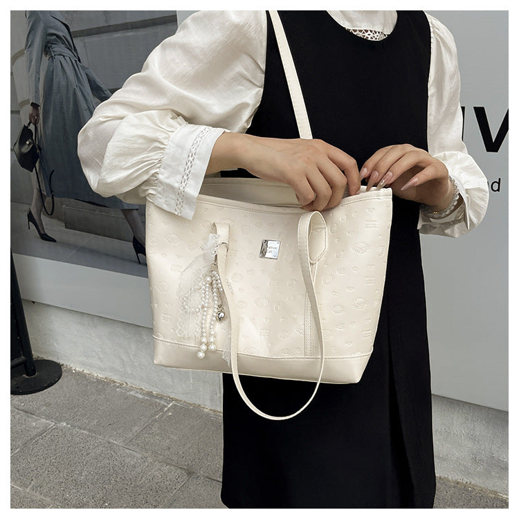 European and American Trendy Simple Large Capacity Tote Bag2025New high-value casual cute embossed single-shoulder handbag