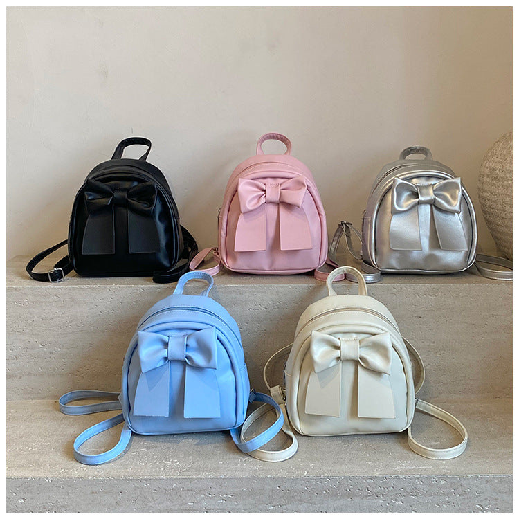 2025Summer New Niche Bow Backpack for Women, Stylish and Simple Handheld, Single Shoulder, Crossbody, and Double Shoulder Backpack