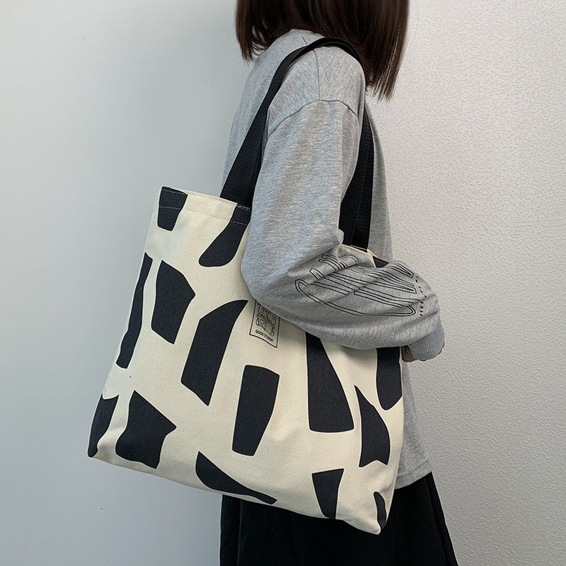 Canvas bag for women, single shoulder, suitable for college students to carry books ins Korean Style Zippered Artistic Design Handheld Canvas Bag