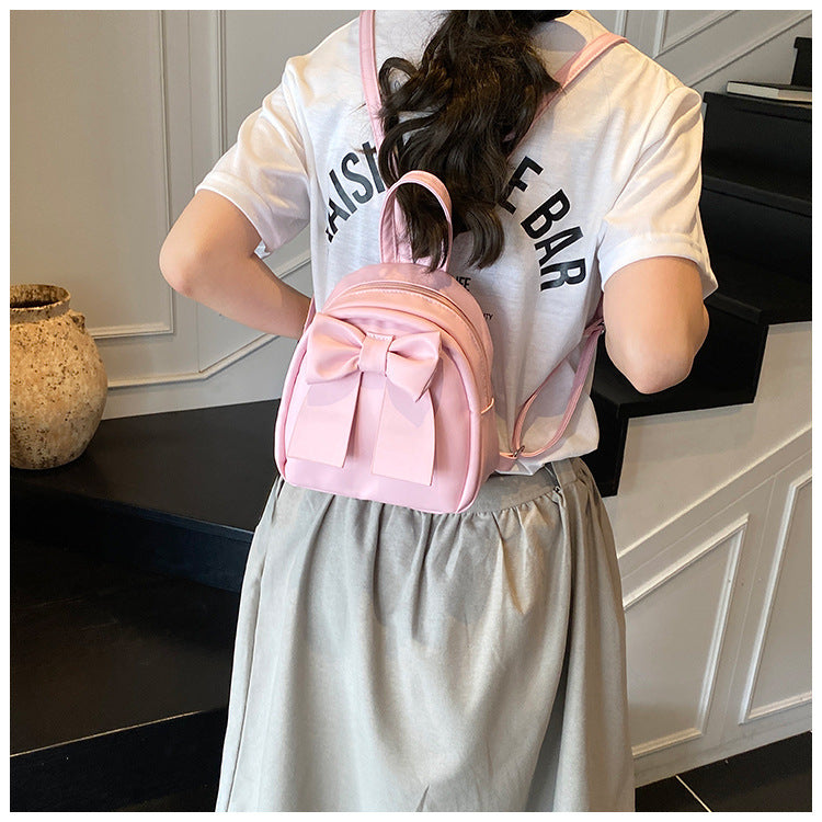 2025Summer New Niche Bow Backpack for Women, Stylish and Simple Handheld, Single Shoulder, Crossbody, and Double Shoulder Backpack