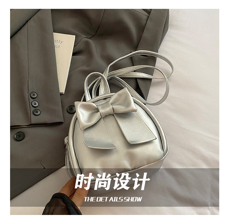 2025Summer New Niche Bow Backpack for Women, Stylish and Simple Handheld, Single Shoulder, Crossbody, and Double Shoulder Backpack