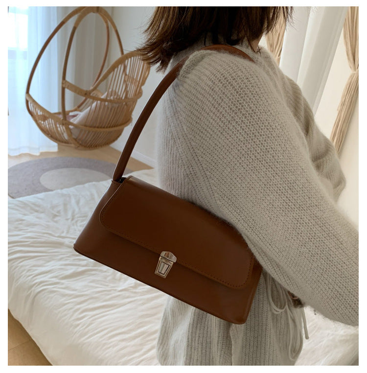 Textured French Style Women's New Fashion Retro2025Large Capacity Casual Solid Color Lock Buckle Handheld Baguette Underarm Bag for Women