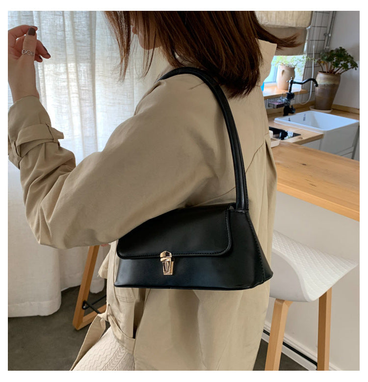 Textured French Style Women's New Fashion Retro2025Large Capacity Casual Solid Color Lock Buckle Handheld Baguette Underarm Bag for Women