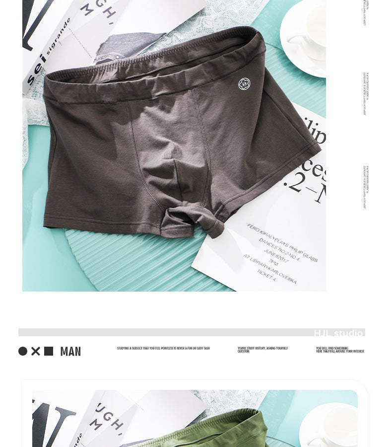 Huajie Long Solid Color Cotton Underwear Men's Underwear Slim Fit Boxer Briefs Simple Breathable Men's Comfortable Boxer Briefs Wholesale http://detail.1688.com/offer/783105309256.html