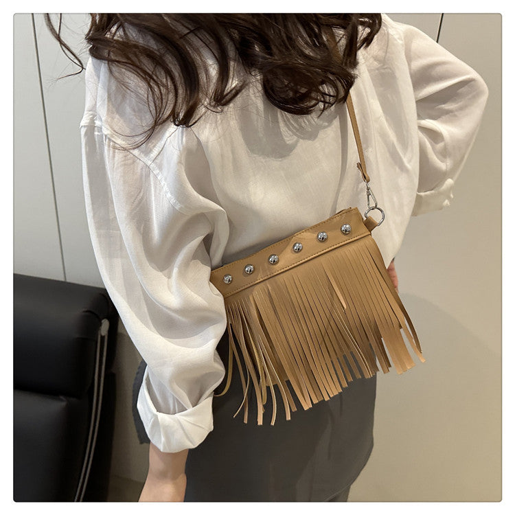 French retro tassel commuter bucket bag for women2025Summer new cross-border style soft shoulder crossbody tassel bag