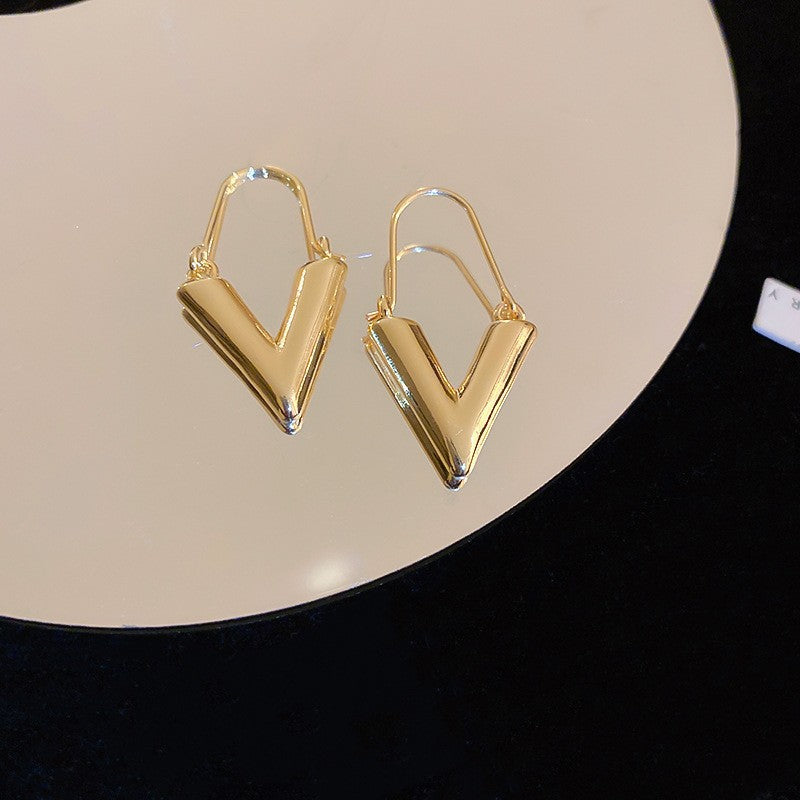 Silver Needle Metal Earrings High-end Simple Stud Earrings Fashion Versatile Light Luxury Unique Niche Earrings Yiwu Wholesale