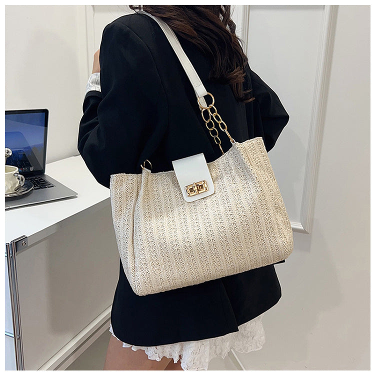 2025Women's Spring New Small Chanel Style Bag for Work Commute Versatile Straw Woven Large Capacity Wide Shoulder Strap Women's Single Shoulder Bag