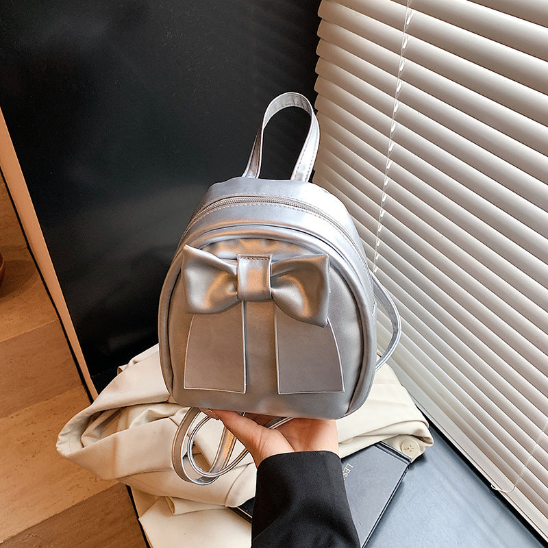 2025Summer New Niche Bow Backpack for Women, Stylish and Simple Handheld, Single Shoulder, Crossbody, and Double Shoulder Backpack