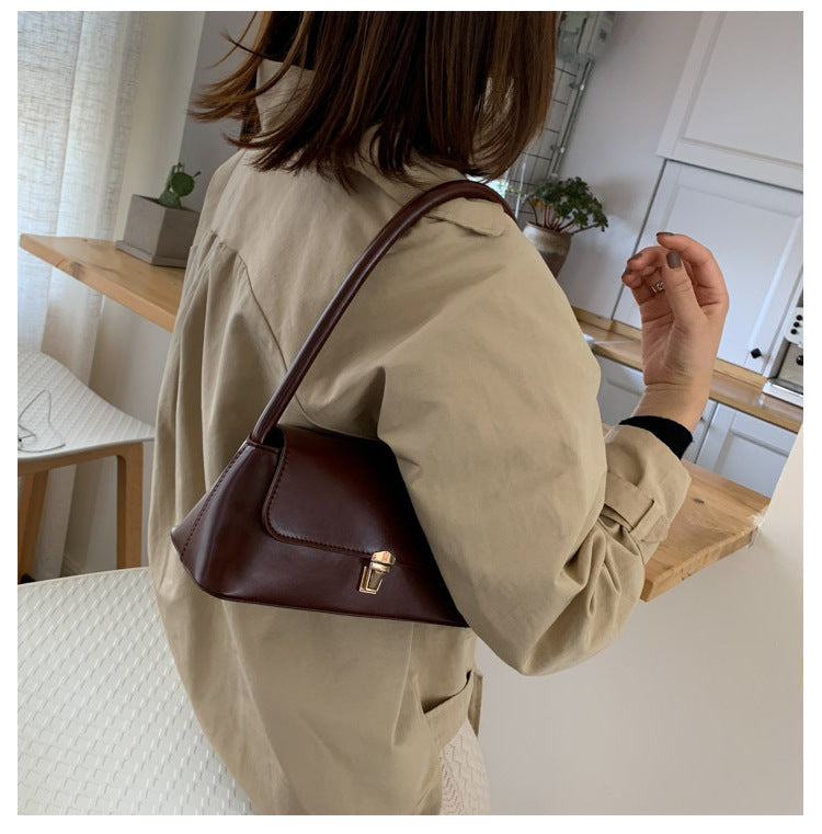 Textured French Style Women's New Fashion Retro2025Large Capacity Casual Solid Color Lock Buckle Handheld Baguette Underarm Bag for Women