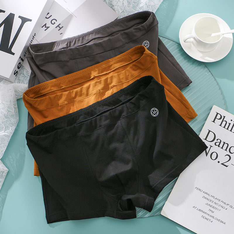 Huajie Long Solid Color Cotton Underwear Men's Underwear Slim Fit Boxer Briefs Simple Breathable Men's Comfortable Boxer Briefs Wholesale http://detail.1688.com/offer/783105309256.html