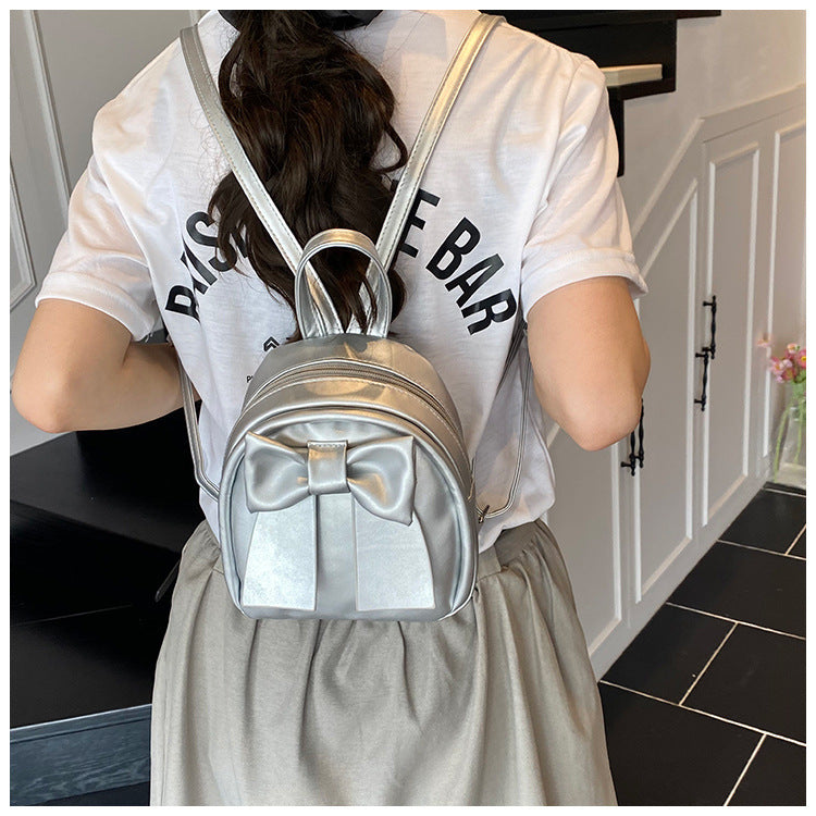 2025Summer New Niche Bow Backpack for Women, Stylish and Simple Handheld, Single Shoulder, Crossbody, and Double Shoulder Backpack