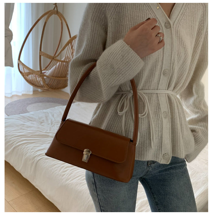 Textured French Style Women's New Fashion Retro2025Large Capacity Casual Solid Color Lock Buckle Handheld Baguette Underarm Bag for Women