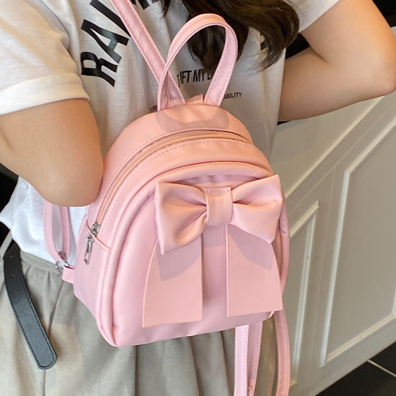 2025Summer New Niche Bow Backpack for Women, Stylish and Simple Handheld, Single Shoulder, Crossbody, and Double Shoulder Backpack