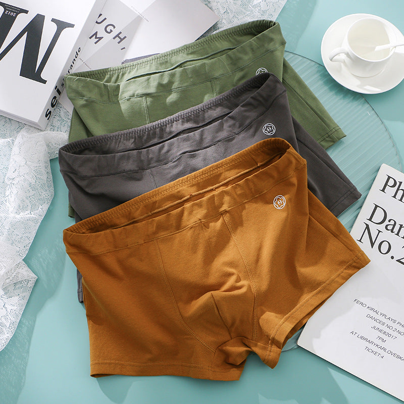 Huajie Long Solid Color Cotton Underwear Men's Underwear Slim Fit Boxer Briefs Simple Breathable Men's Comfortable Boxer Briefs Wholesale http://detail.1688.com/offer/783105309256.html