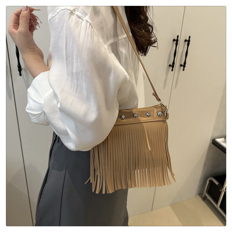 French retro tassel commuter bucket bag for women2025Summer new cross-border style soft shoulder crossbody tassel bag