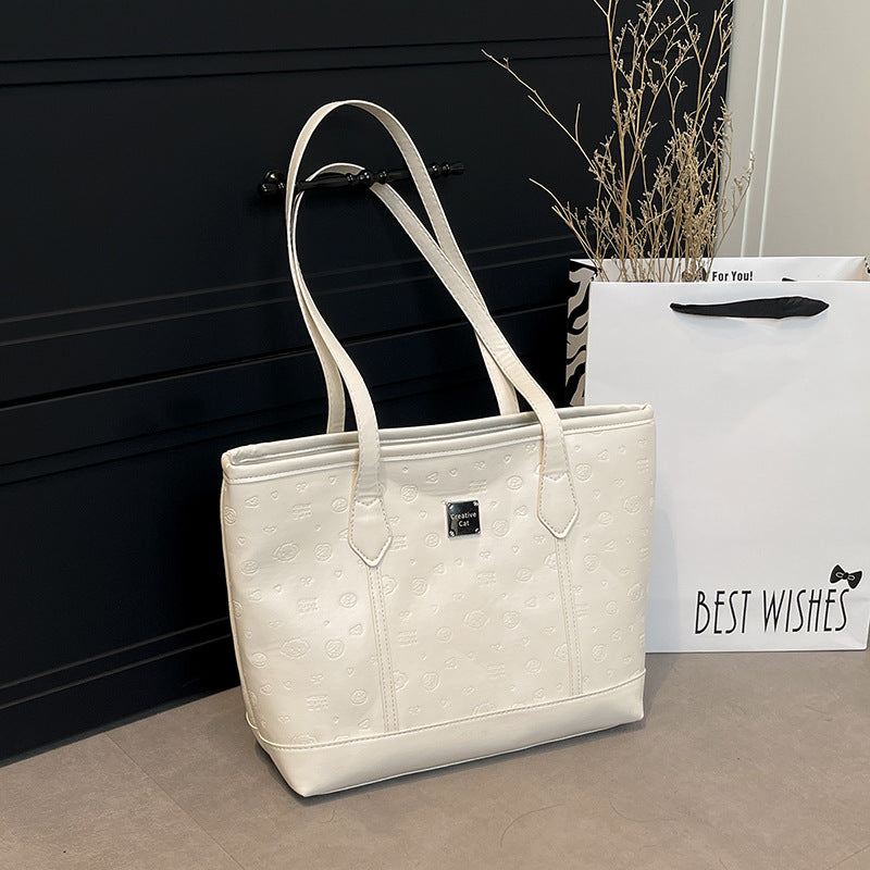 European and American Trendy Simple Large Capacity Tote Bag2025New high-value casual cute embossed single-shoulder handbag