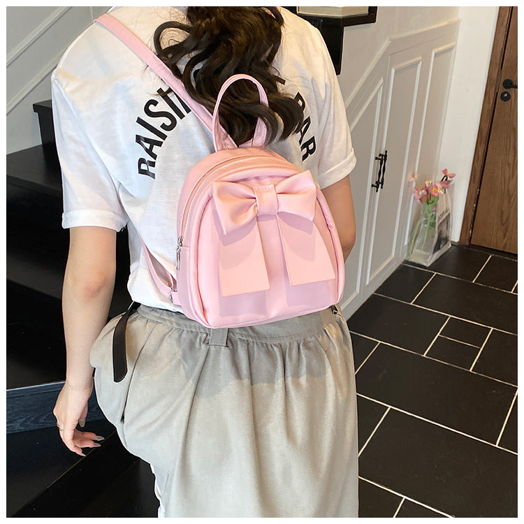 2025Summer New Niche Bow Backpack for Women, Stylish and Simple Handheld, Single Shoulder, Crossbody, and Double Shoulder Backpack