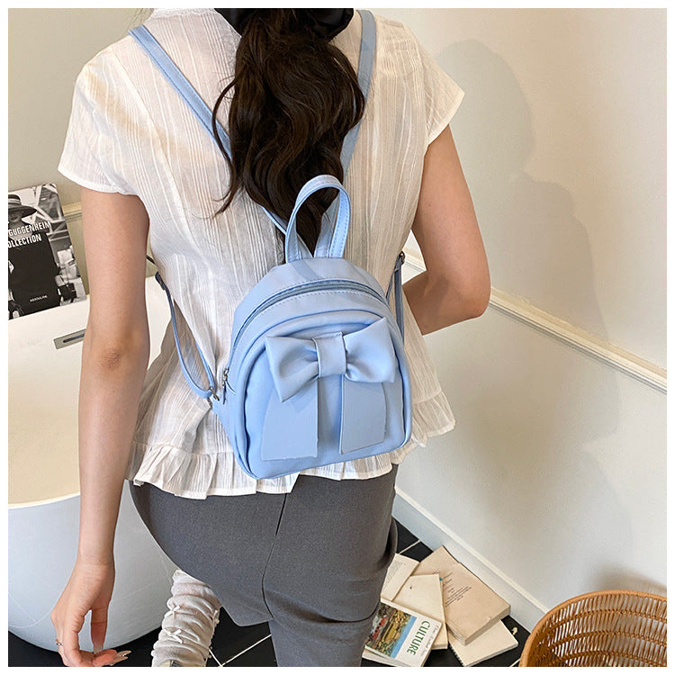 2025Summer New Niche Bow Backpack for Women, Stylish and Simple Handheld, Single Shoulder, Crossbody, and Double Shoulder Backpack