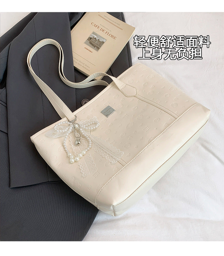 European and American Trendy Simple Large Capacity Tote Bag2025New high-value casual cute embossed single-shoulder handbag