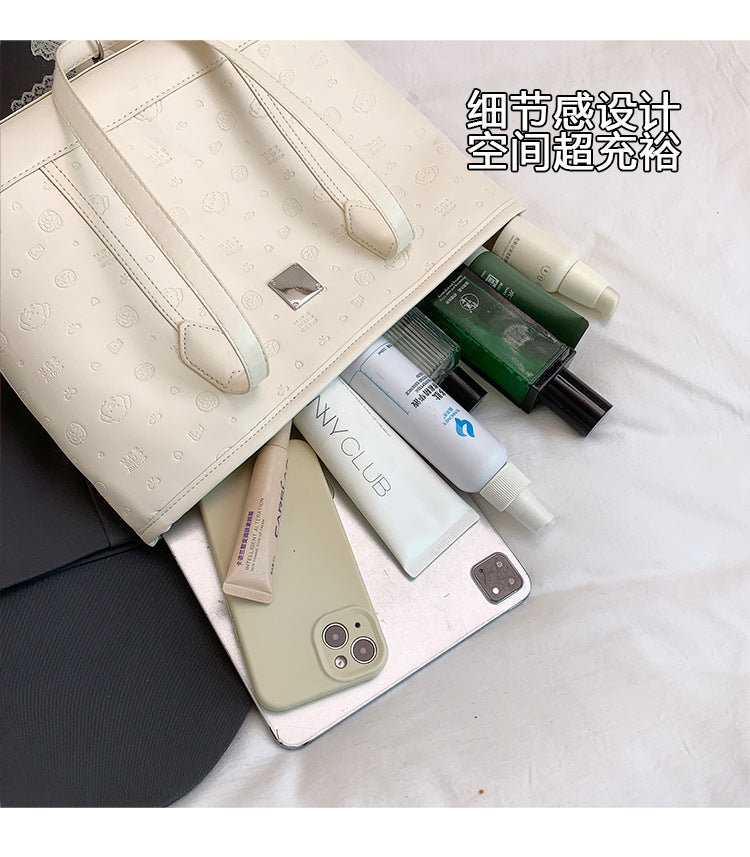 European and American Trendy Simple Large Capacity Tote Bag2025New high-value casual cute embossed single-shoulder handbag