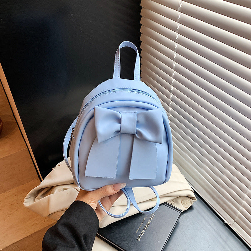 2025Summer New Niche Bow Backpack for Women, Stylish and Simple Handheld, Single Shoulder, Crossbody, and Double Shoulder Backpack