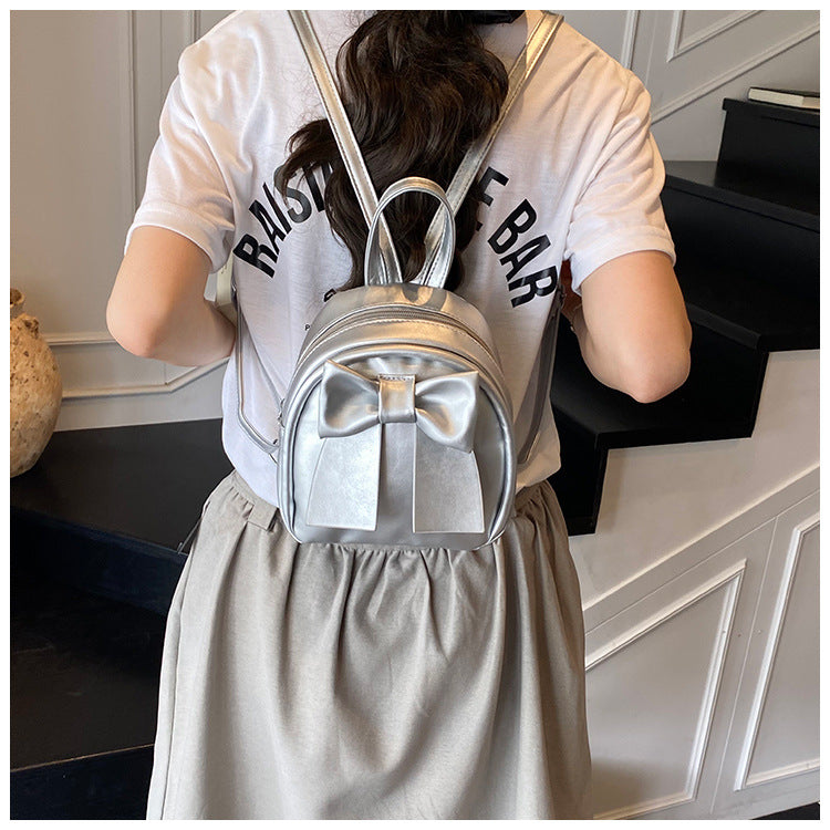 2025Summer New Niche Bow Backpack for Women, Stylish and Simple Handheld, Single Shoulder, Crossbody, and Double Shoulder Backpack