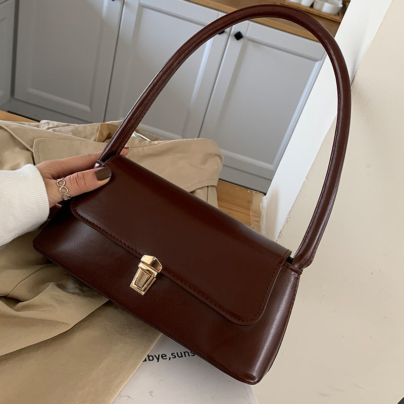Textured French Style Women's New Fashion Retro2025Large Capacity Casual Solid Color Lock Buckle Handheld Baguette Underarm Bag for Women