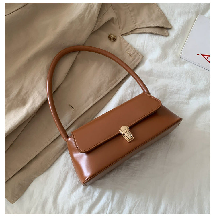 Textured French Style Women's New Fashion Retro2025Large Capacity Casual Solid Color Lock Buckle Handheld Baguette Underarm Bag for Women