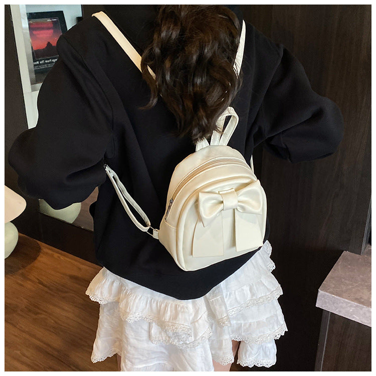 2025Summer New Niche Bow Backpack for Women, Stylish and Simple Handheld, Single Shoulder, Crossbody, and Double Shoulder Backpack