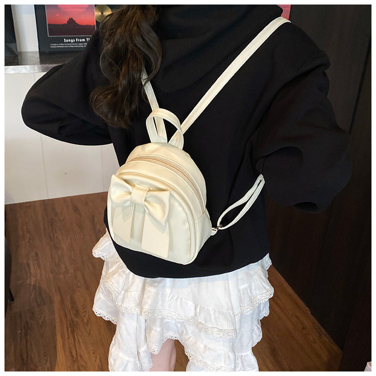 2025Summer New Niche Bow Backpack for Women, Stylish and Simple Handheld, Single Shoulder, Crossbody, and Double Shoulder Backpack